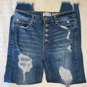 Indigo Reign button-fly distressed skinny jeans